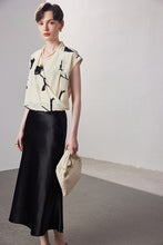 Sleeveless printed V-neck silk blouse