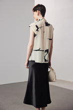 Sleeveless printed V-neck silk blouse