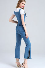 OVERALL JEANS WITH LEG SLITS