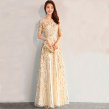 Luxury elegant golden sequined long gown dress