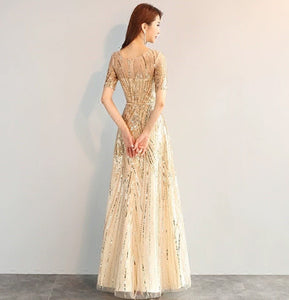 Luxury elegant golden sequined long gown dress