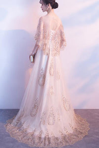 SLEEVELESS SEQUIN TULLE GOWN WITH  MESH CAPE