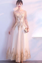 LONG SLEEVE SEQUIN TULLE GOWN