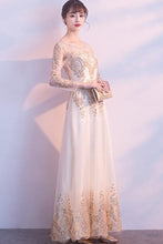 LONG SLEEVE SEQUIN TULLE GOWN